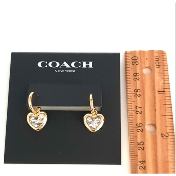 Coach Signed Gold Tone Huggie Hoop Post Earrings Clear Crystal Heart Dangle NWT - Picture 6 of 6
